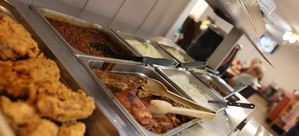 selective focus on buffet, food, fried chicken, ribs, pork steak, etc. Kim's Place Café - Jacksonville, IL